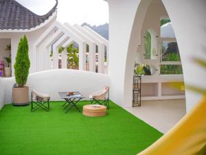 Um jardim no exterior de Wang Yun Residence Boutique Homestay Zhangjiajie