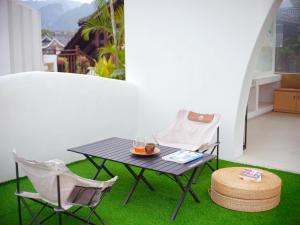 Uma área de estar em Wang Yun Residence Boutique Homestay Zhangjiajie
