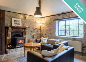 Posezení v ubytování Ventry Farm - Seaside Cottage by Trident Holiday Homes