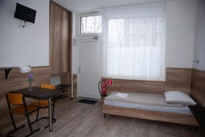 Posteľ alebo postele v izbe v ubytovaní Noclegi "Poza Szlakiem"