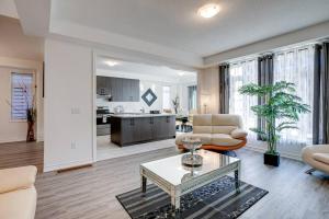 a living room with a couch and a table at Beautiful oasis in Midhurst