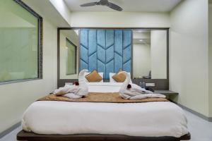 Katil atau katil-katil dalam bilik di Hotel Shree Residency Lodging & Boarding +70 gambar