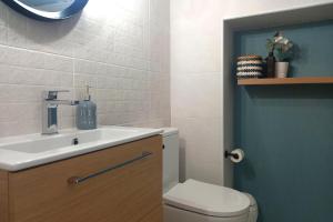 Um banheiro em Apartamentos Vela Blanca