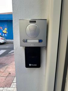 a security box on the side of a building at Apartamento Avenida Velazquez Planta Baja in Málaga