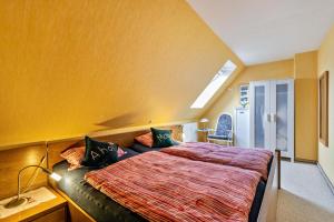 Ένα ή περισσότερα κρεβάτια σε δωμάτιο στο Utspann