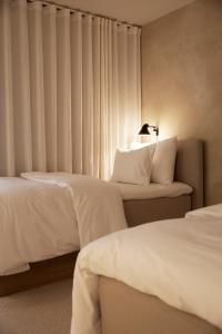 Letto o letti in una camera di Hotel Vyn