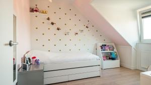 En eller flere senge i et værelse på Casa Jill