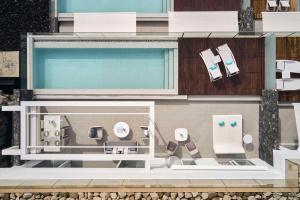 a model of a building with chairs and toilets at Royal Hideaway Corales Suites in Adeje