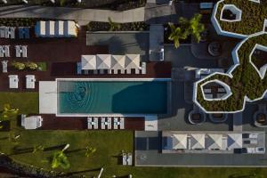 an overhead view of a swimming pool in a yard at Royal Hideaway Corales Beach - Adults Only in Adeje
