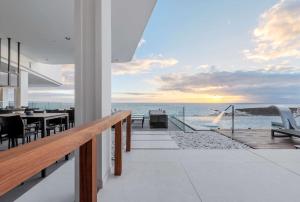 a view of the ocean from the balcony of a house at Royal Hideaway Corales Beach - Adults Only in Adeje