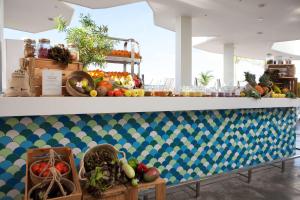 a counter filled with lots of fresh fruits and vegetables at Royal Hideaway Corales Beach - Adults Only in Adeje
