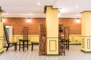 Restaurace v ubytování 75 Paradise Lane Managed by Loft Group