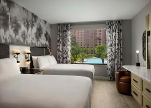 Cama ou camas em um quarto em Caribe Royale Orlando