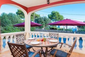 Balkón nebo terasa v ubytování Villa with Pool (S'Aferrada) ETV/3439-8pax