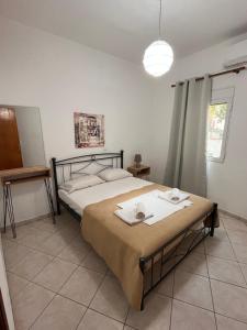 Postel nebo postele na pokoji v ubytování Maria Apts