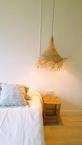 Uma cama ou camas num quarto em COLLECTION PORT - B&B Boutique , Alicante Center