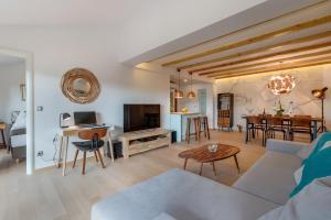 a living room with a couch and a table at Villa Lavanda - Kandija in Cunski