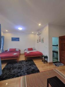 Voodi või voodid majutusasutuse The Hub Kampot toas