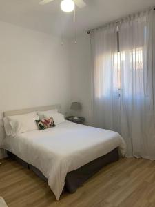 Posteľ alebo postele v izbe v ubytovaní Luxury Apart, Málaga Centro
