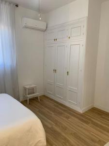 Posteľ alebo postele v izbe v ubytovaní Luxury Apart, Málaga Centro