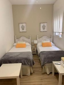 Posteľ alebo postele v izbe v ubytovaní Luxury Apart, Málaga Centro
