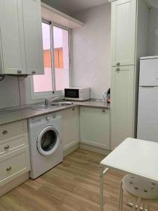 Kuchyňa alebo kuchynka v ubytovaní Luxury Apart, Málaga Centro