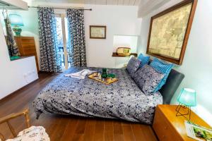 Postel nebo postele na pokoji v ubytování Lillac Cottage