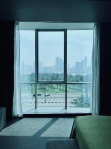 72 Hotel Sharjah客房内的一张或多张床位