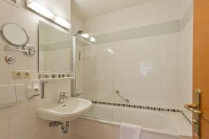 Koupelna v ubytování Burghotel Aschau