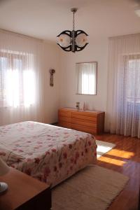 Ένα ή περισσότερα κρεβάτια σε δωμάτιο στο Apartment Relax Natura