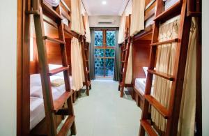 Katil atau katil-katil dalam bilik di Pudak Sari Unizou Hostel