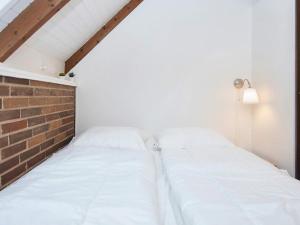 Katil atau katil-katil dalam bilik di Holiday home Toftlund XXIII