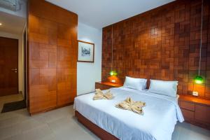 Katil atau katil-katil dalam bilik di Pudak Sari Unizou Hostel