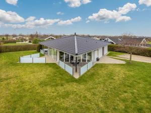 an overhead view of a house with a roof at Holiday home Sydals XCIX in Neder Lysabild