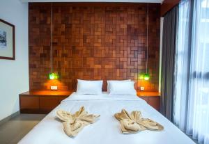 Katil atau katil-katil dalam bilik di Pudak Sari Unizou Hostel