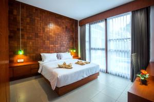 Katil atau katil-katil dalam bilik di Pudak Sari Unizou Hostel