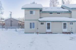 a house with snow on top of it at Alaska Daydream Retreat Near Downtown in Fairbanks