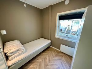 Modern Central Apartment Apt 105 tesisinde bir odada yatak veya yataklar