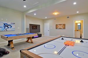 a large room with a pool table in it at Stunning 6 Bedroom Near Downtown in San Antonio