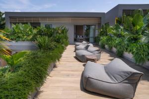 Posezení v ubytování Sin Nombre Bali - Sauna, Ice Bath & Roof Terrace + 37 fotografií