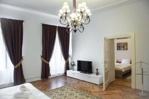 Katil atau katil-katil dalam bilik di Apartament Piata Mica