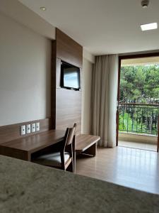Μια τηλεόραση ή/και κέντρο ψυχαγωγίας στο Vista Azul Apart Hotel - Vista Pinheiros