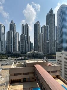 a view of a city skyline with tall buildings at Backpackers zone in Dubai