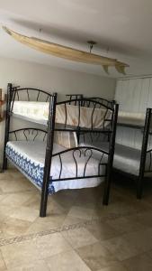 Poschodová posteľ alebo postele v izbe v ubytovaní Margaritas Eco Haus