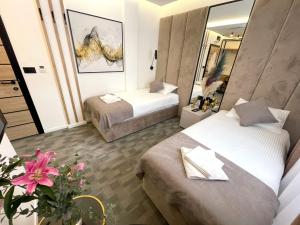 Letto o letti in una camera di Hotel NPL CODE