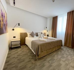 Letto o letti in una camera di Hotel NPL CODE