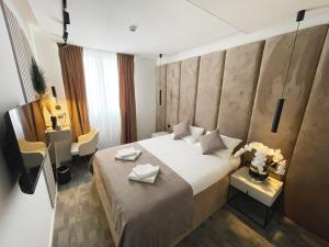 Letto o letti in una camera di Hotel NPL CODE