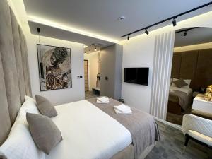 Letto o letti in una camera di Hotel NPL CODE