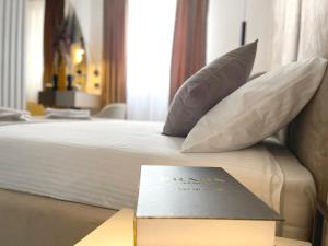 Letto o letti in una camera di Hotel NPL CODE