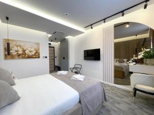 TV o dispositivi per l'intrattenimento presso Hotel NPL CODE